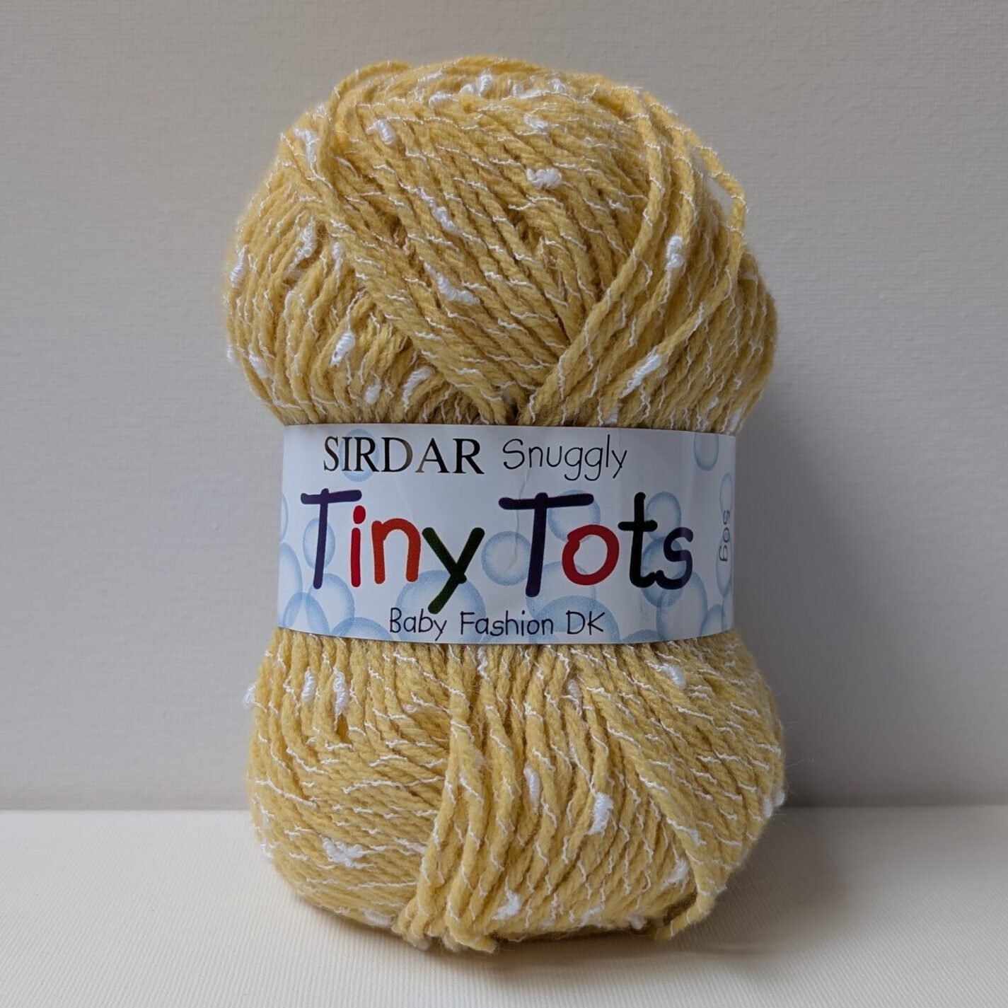 Sirdar Snuggly Tiny Tots DK yarn in Little Bee, shade 986